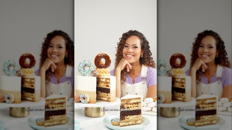 Yolanda Gampp posing with a cake