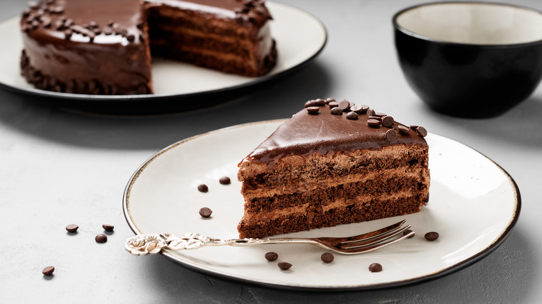 A cut slice of chocolate cake