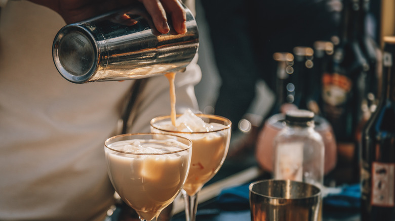 bartender pouring cocktail