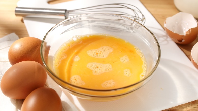 whisked egg yolks in bowl