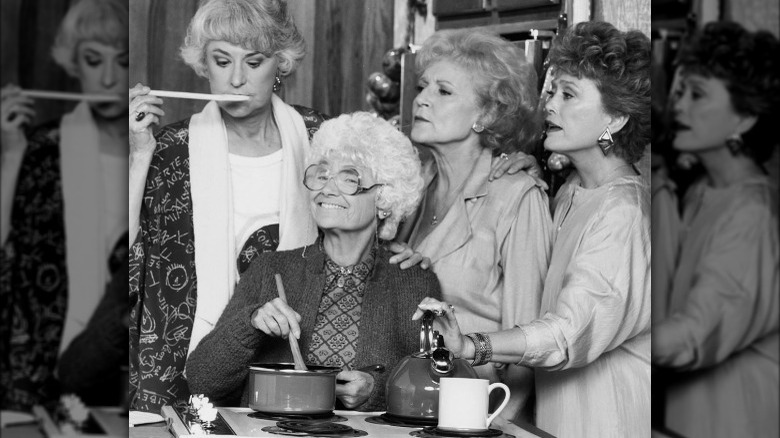 Blanche, Sophia, Dorothy, and Rose from the Golden Girls cooking