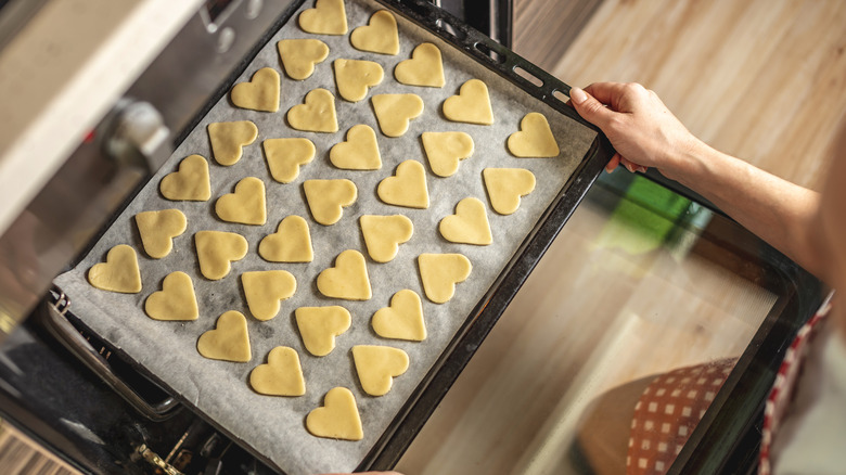 Cookie sheet going into oven