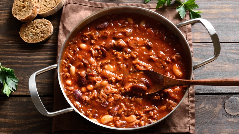 Cowboy beans in a pot with bread