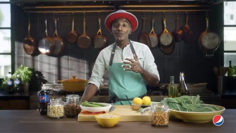 Marcus Samuelsson talking in kitchen