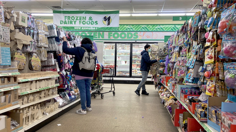 Customers shop in Dollar Tree