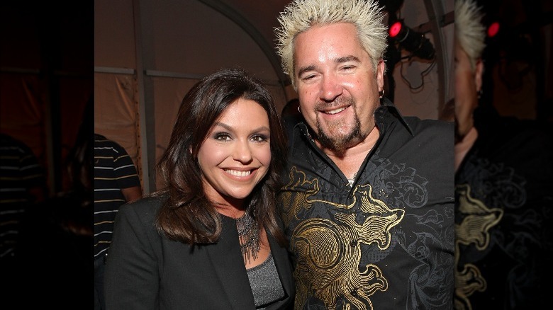 Rachael Ray and Guy Fieri smiling