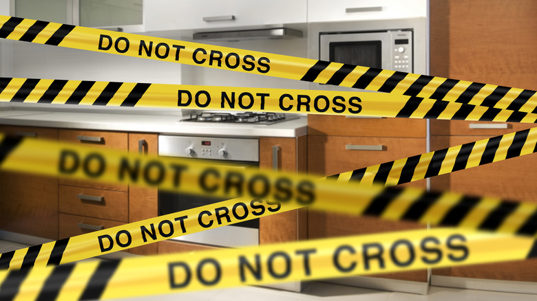 kitchen with caution tape