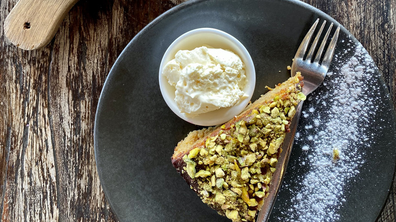 slice of pistachio cake on a plate