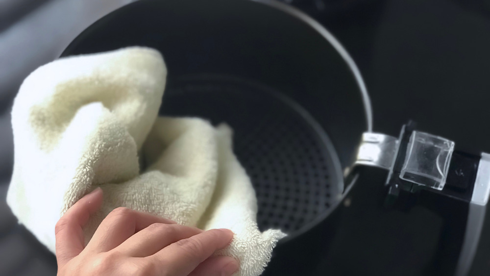 Towel cleaning out air fryer