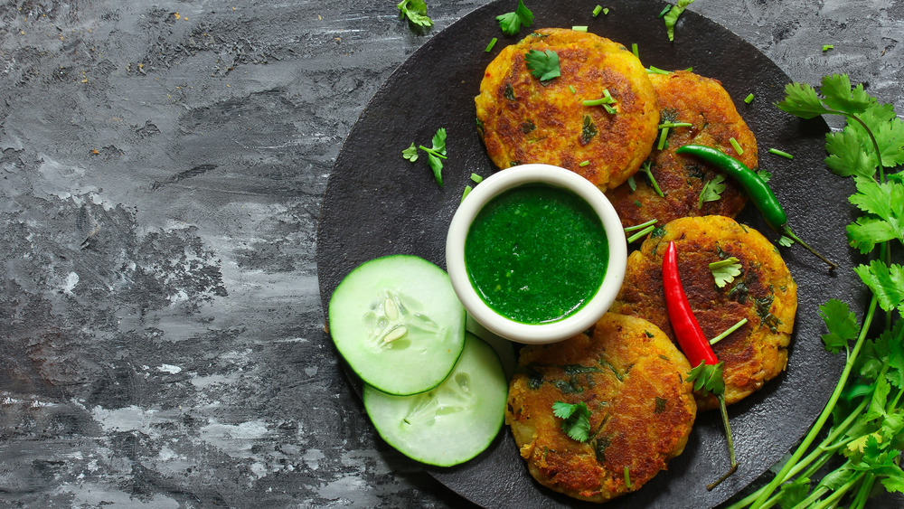 Potato fritters and green chutney