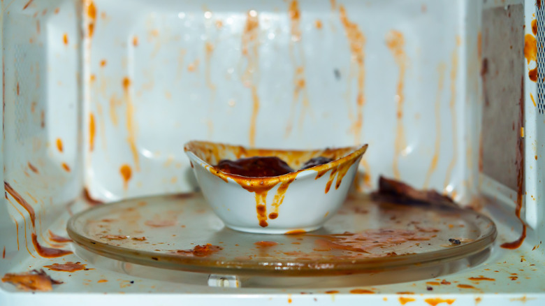 exploded sauce on the sides of microwave