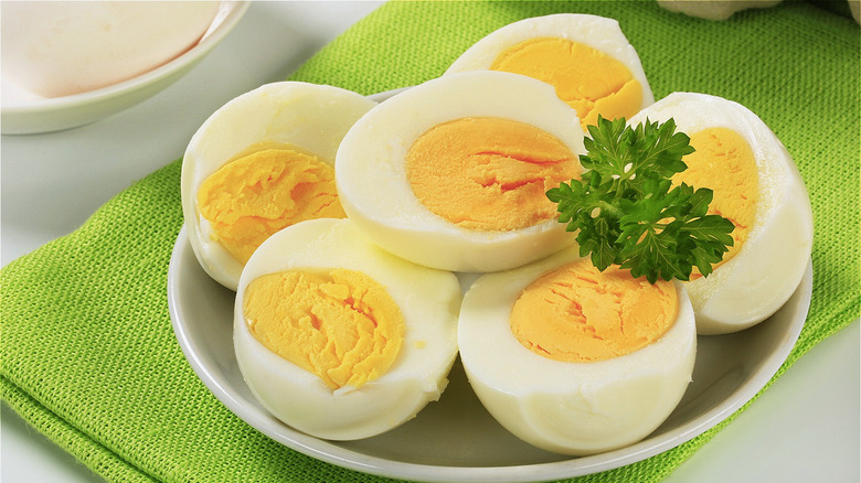 plate of hard boiled eggs with parsley