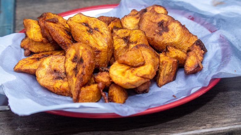 Fried plantains in red and white dish