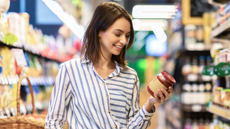 Woman checking a label 