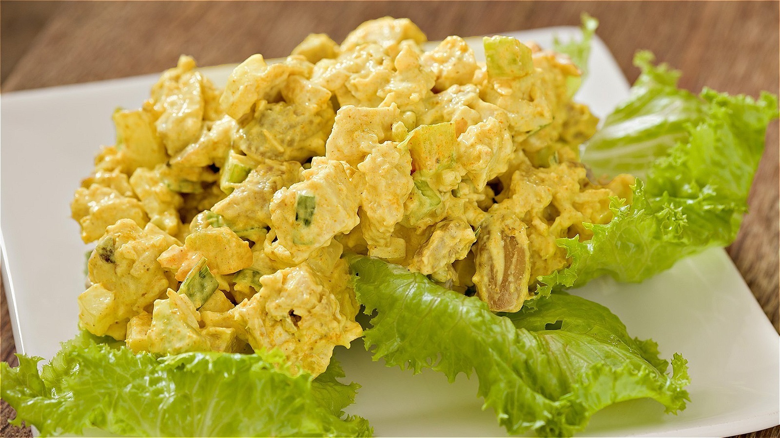 https://www.mashed.com/img/gallery/your-chicken-salad-deserves-a-curried-twist/l-intro-1690061168.jpg