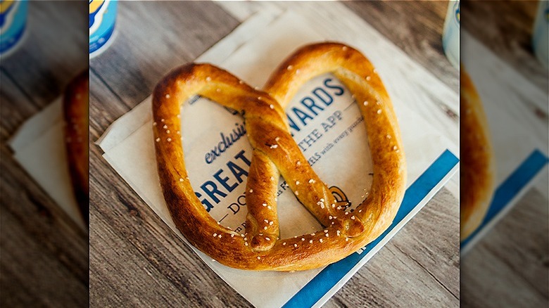 Soft pretzel on napkin