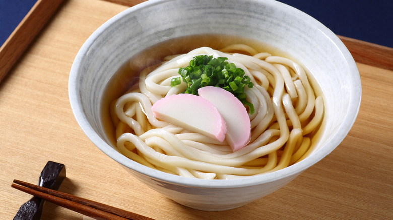 udon noodles in bowl with dashi broth