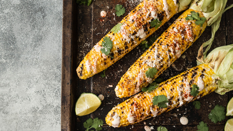 corn on the cob on a tray