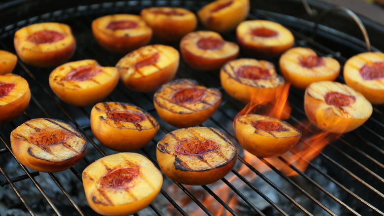 Peaches with char marks on a grill