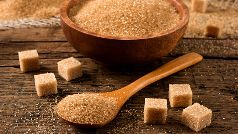 A bowl of brown sugar and sugar cubes