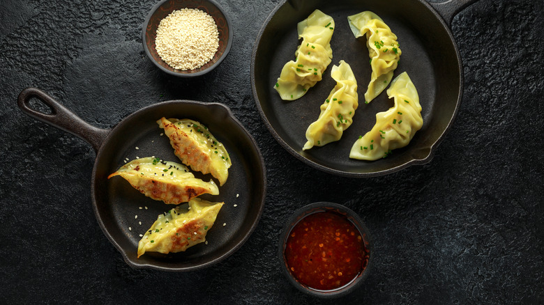 Potstickers in cast iron skillet before and after cooking