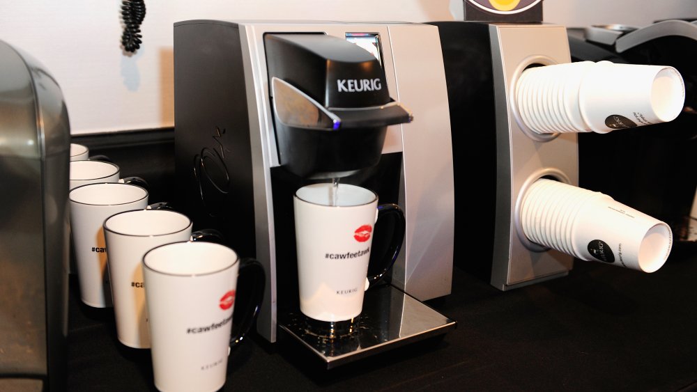 Keurig with stacks of cups