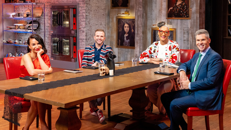 Halloween Baking Championship judges sitting around table