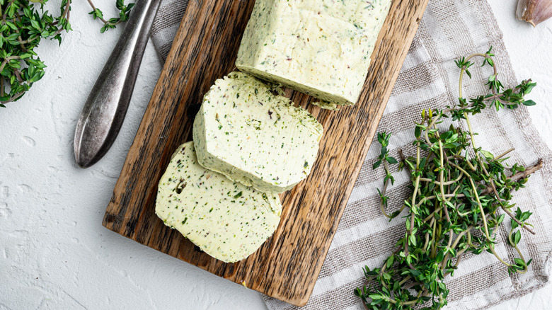 Compound butter on wooden board