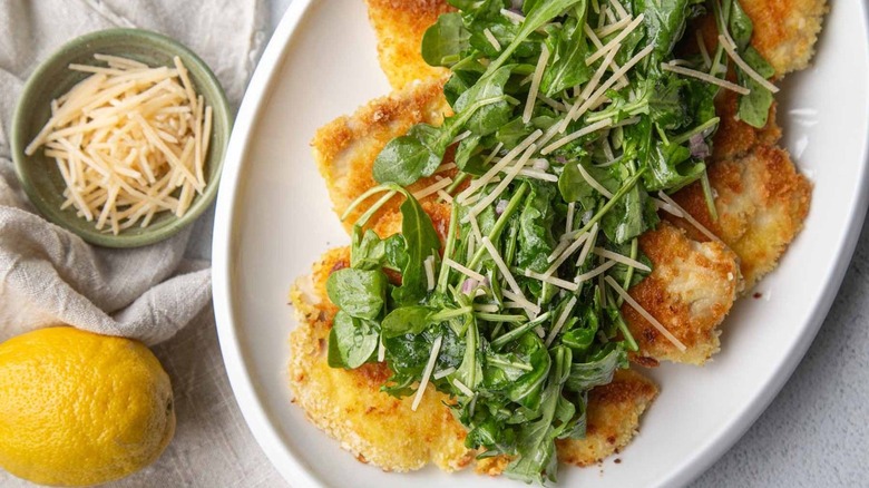 fried fish with salad