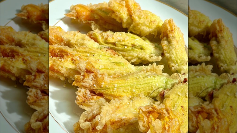 fried zuchini flowers on plate 